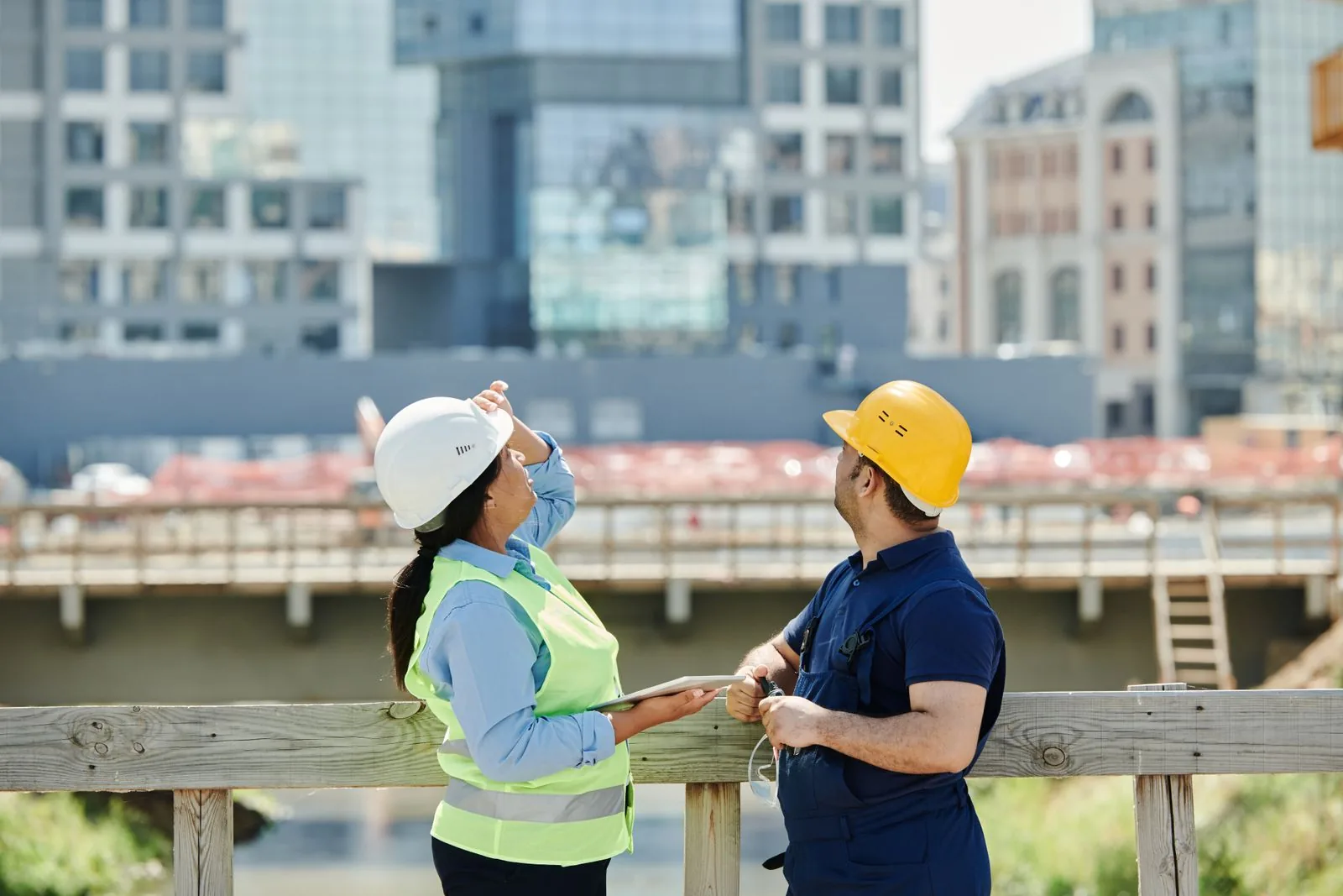 Site engineer reviewing execution details